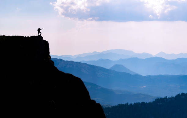 istock high mountains, summit success and target adventure 1058834030