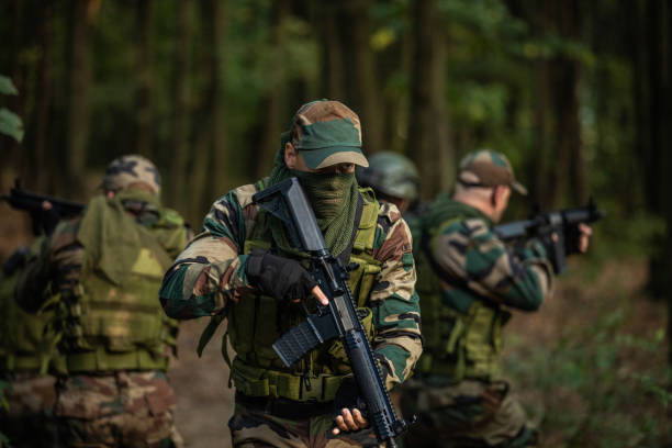 istock Military mission in the forest 1058839782