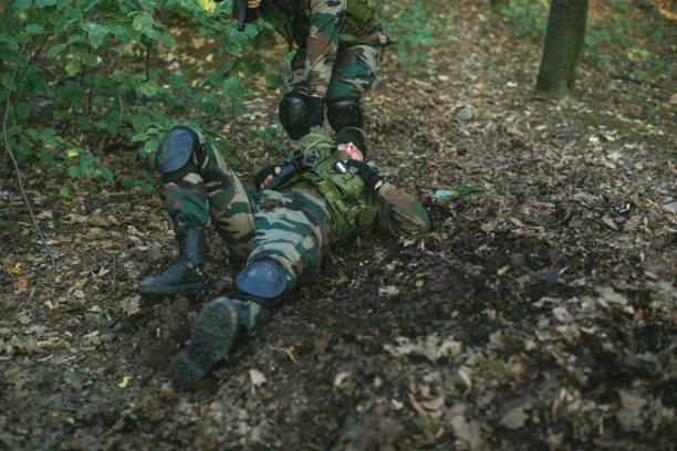 istock Special Army Unit Helping Injured Soldier 1058840608