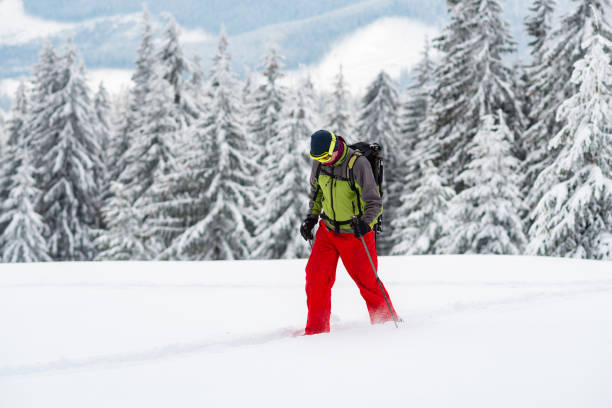 istock Adventurer struggles through the deep snow 1058842658