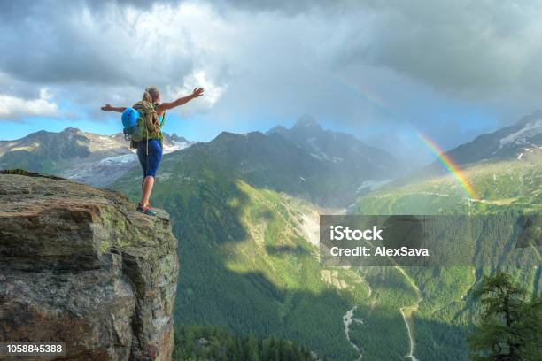 Woman Celebrating Success On The Mountain Stock Photo - Download Image Now - Rainbow, Hiking, Republic Of Cyprus