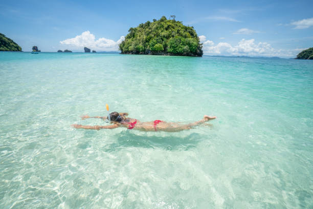 istock Snorkelling girl in Thailand 1058846138