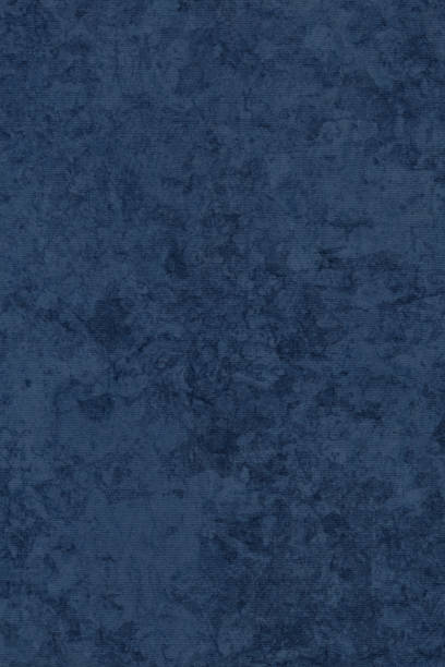 istock Dark Navy Blue Striped Mottled Pastel Paper Coarse Grain Grunge Background Texture 1058848456