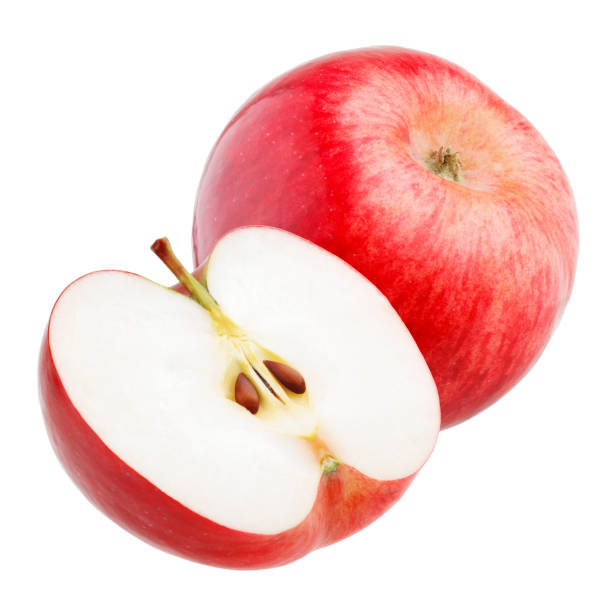 istock Ripe red apple with half isolated on white background 1058848552