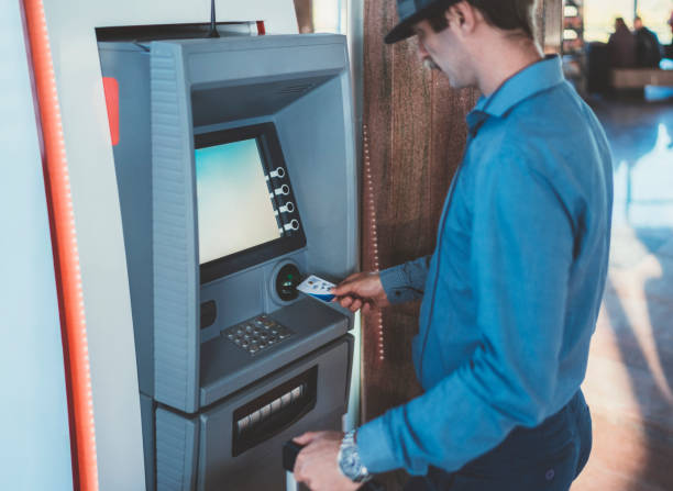 istock Passenger withdrawing money at the ATM 1058848672