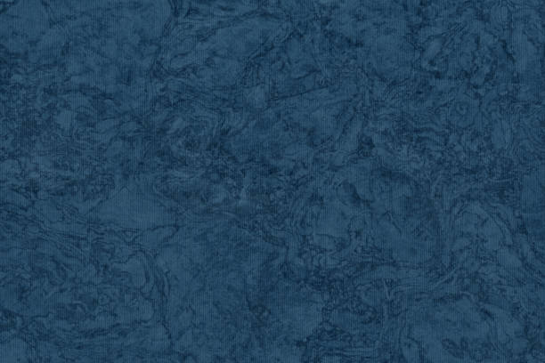 istock Dark Navy Blue Striped Mottled Pastel Paper Coarse Grain Grunge Background Texture 1058848778