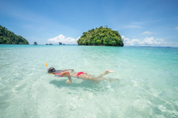 istock Snorkelling girl in Thailand 1058848812