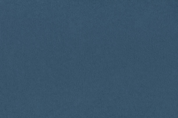 istock Dark Navy Blue Striped Pastel Paper Coarse Grain Grunge Background Texture 1058851950