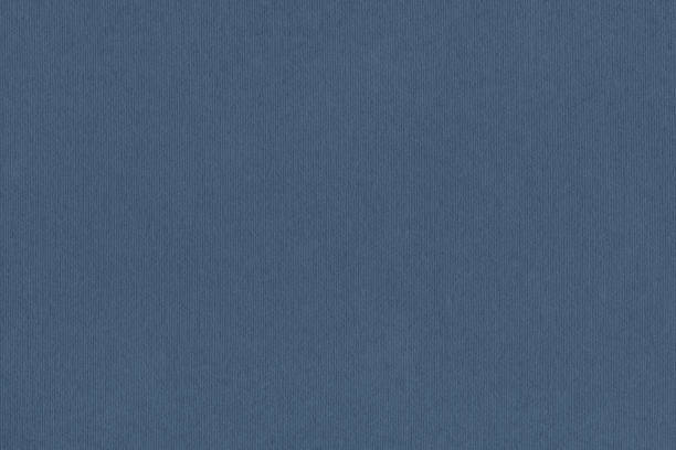 istock Dark Navy Blue Striped Pastel Paper Coarse Grain Grunge Background Texture 1058852138