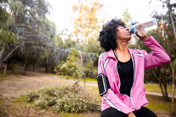 istock Young Black Woman Hydrating 1058854838