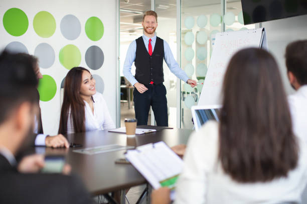 istock Group of business people at meeting 1058857066