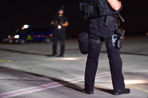 Night scene with special forces showing their skills in a simulated hostage rescue drill