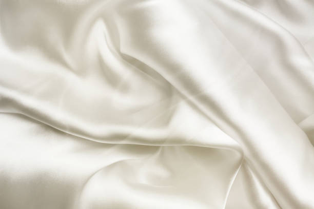istock Macro image of satin silk, elegant fabric for backgrounds 1058864936