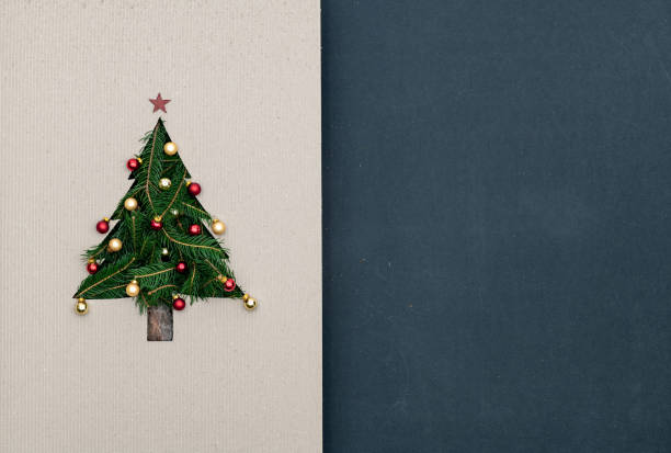 istock Text or logo empty copy space in vertical top view dark blackboard with natural eco decorated christmas tree pine in cardboard.Xmas winter holiday season party social media card background 1058880884