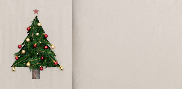 istock Text or logo empty copy space in vertical top view cardboard with natural eco decorated christmas tree pine.Xmas winter holiday season party social media card background 1058883680