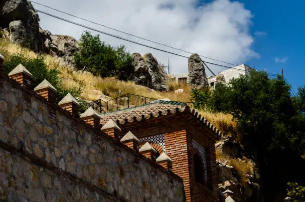 Photo of Typical Moorish defensive walls in a small town of Andalusia, a historic element of architecture