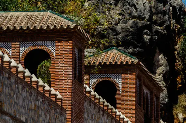 Photo of Typical Moorish defensive walls in a small town of Andalusia, a historic element of architecture