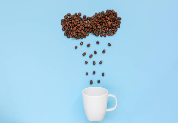 istock Coffee mug and roasted coffee beans concept 1058892118