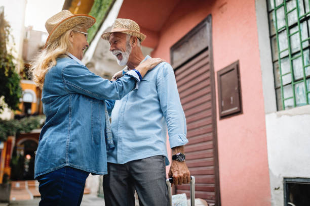 istock Senior couple on travel laughing hard 1058903898