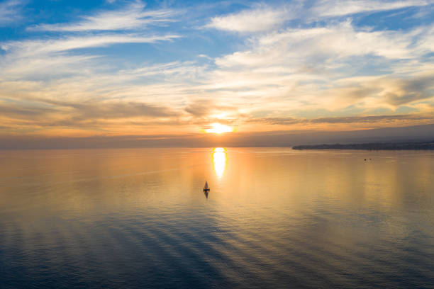 aerial view of a sunset on the leman lake in  ouchy waterfront in  lausanne, switzerland - geneva canton imagens e fotografias de stock