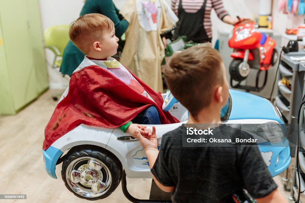 First Haircut Of One Years Old Toddler Baby Boy Having Hair Cut And Crying Stock Photo - Download Image Now - iStock First Haircut Of One Years Old Toddler Baby Boy Having Hair Cut And Crying Stock Photo - Download Image Now - iStock