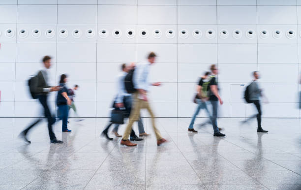 istock blurred business people 1058909010