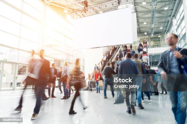 Blurred Business People Stock Photo - Download Image Now - Tradeshow, Exhibition, Crowd of People