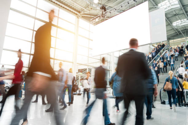 istock blurred business people 1058909098