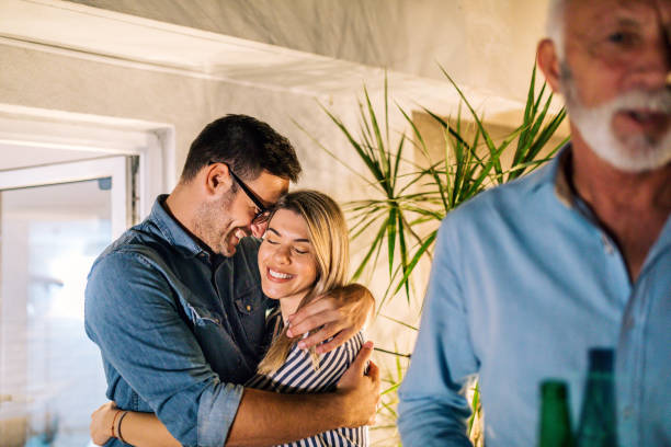 istock Couple embracing each other on a new year's party 1058926598