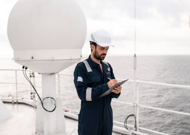istock Service technician or serviceman near VSAT terminal 1058936516
