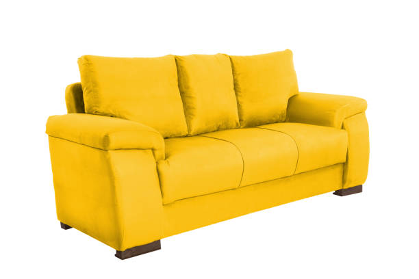 istock Three seats cozy color fabric sofa isolated on white background 1058948976