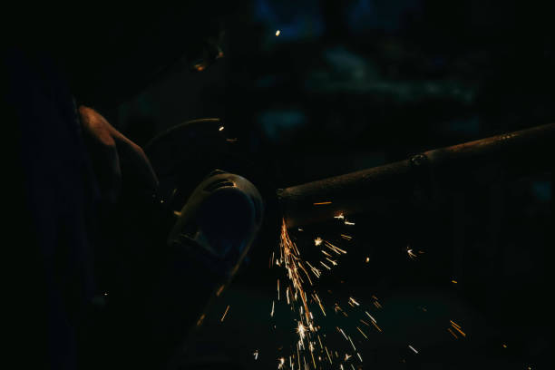 istock Grinding metal - Industrial worker with work tool 1058950828