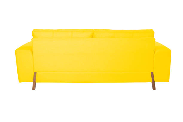istock Three seats cozy white fabric sofa isolated on white background 1058952340