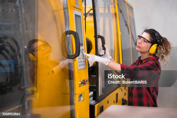 Young Mechanical Engineer Stock Photo - Download Image Now - Manufacturing, Industry, Plastic