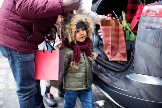 istock Christmas shopping with multi-ethnic family 1058959232