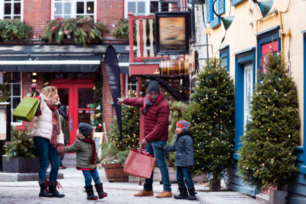 istock Christmas shopping with multi-ethnic family 1058960866