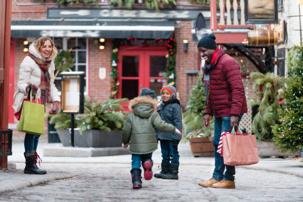 istock Christmas shopping with multi-ethnic family 1058960922