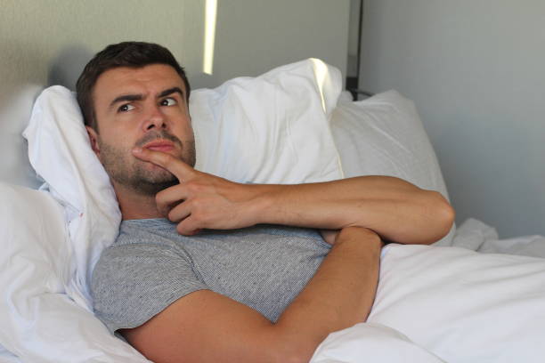 istock Cunning male plotting a revenge in bed 1058962418