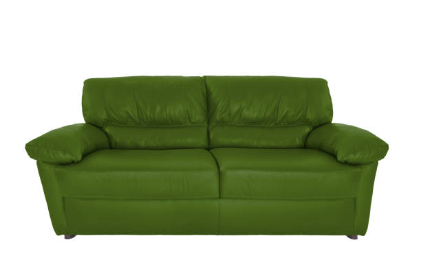 istock Three seats cozy color leather sofa isolated on white background 1058964346