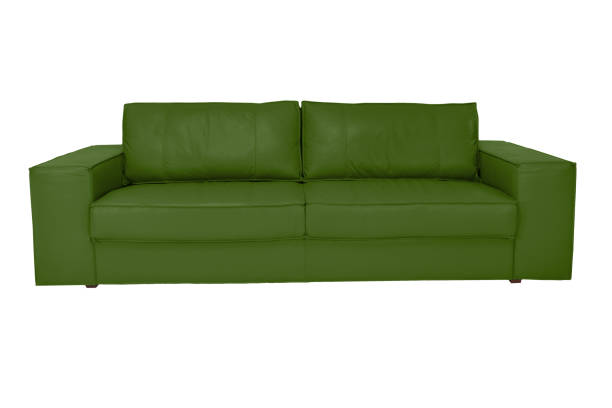 istock Three seats cozy color leather sofa isolated on white background 1058967004