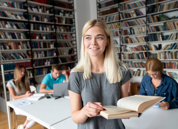 istock Thoughtful student researching at the library 1058967126