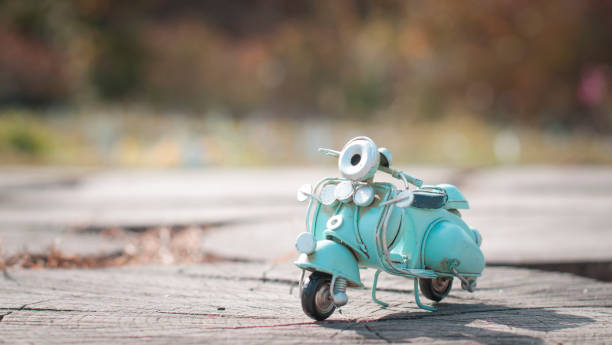vintage miniature toy motorbike stock photo