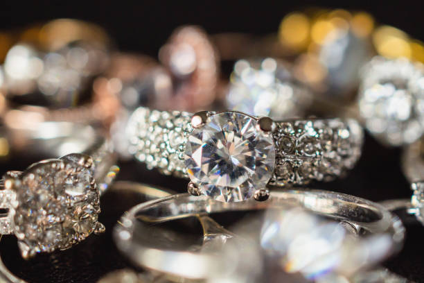 istock Jewelry diamond rings set on black background close up 1058986032