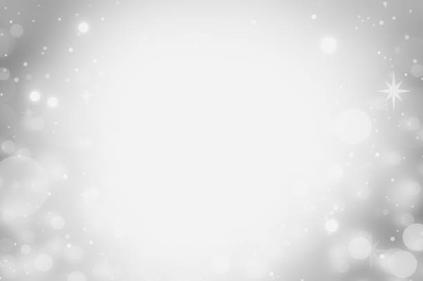 istock White and Silver lights on bokeh abstract background. 1058986120