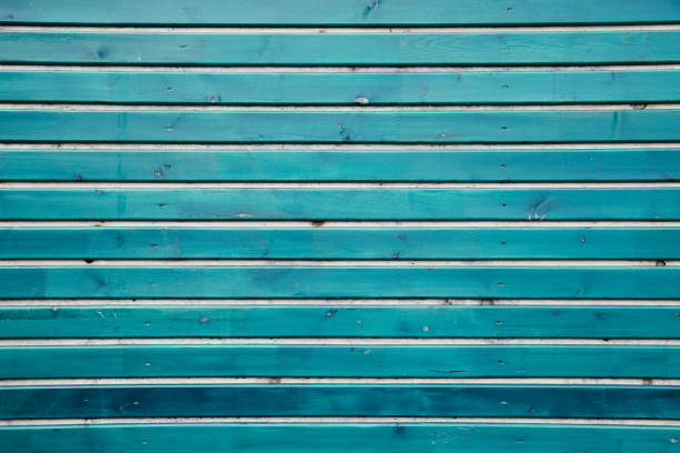 istock Blue color wooden panel wall texture background 1058995082