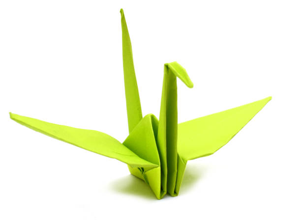 istock Green origami paper crane 1059010952