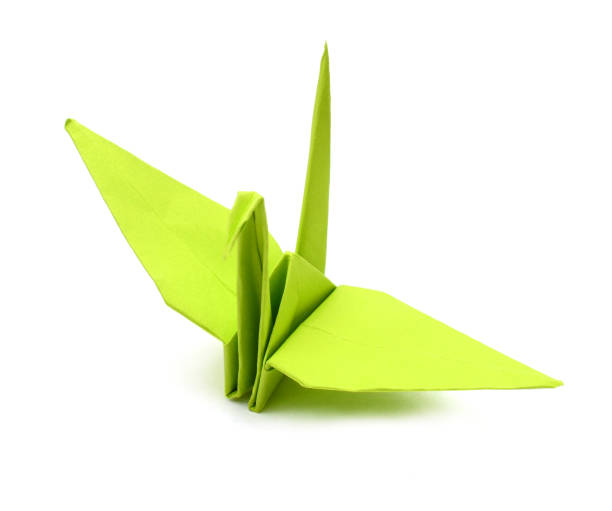 istock Green origami paper crane 1059010964