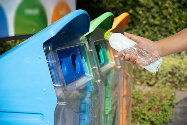 istock man hand putting plastic reuse for recycling concept environmental protection world recycle 1059026156