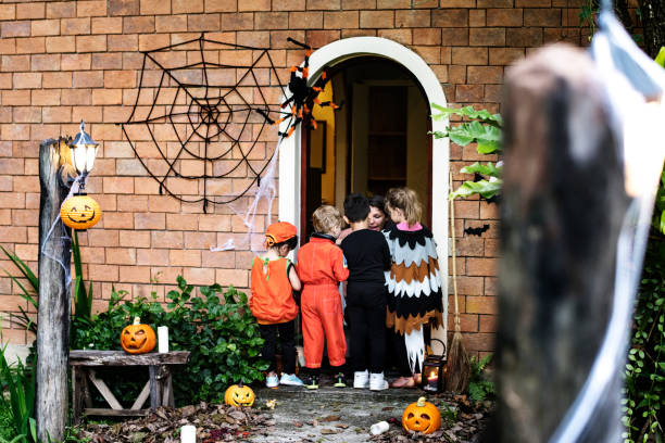 istock Little children trick or treating on Halloween 1059028070