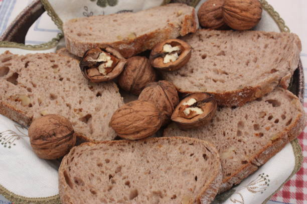 istock Loaf of bread with nuts  Sliced bread  Sliced bread in a basket 1059034716